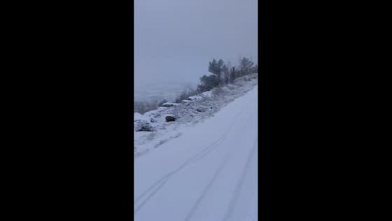 Panoramic snowy view over Pamplona from Monte Ezkaba, Spain