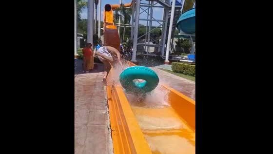 Person falls out of waterslide after being hit by another slider
