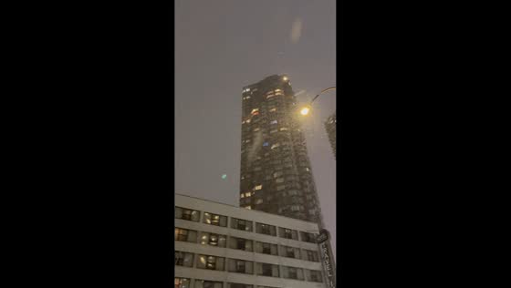 Heavy snowfall blankets West 42nd Street during winter storm, New York, USA