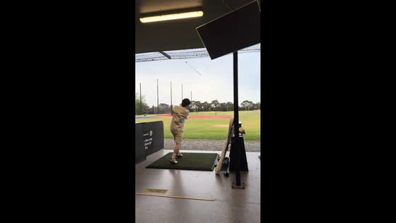 Golfer loses grip of club during swing in Australia