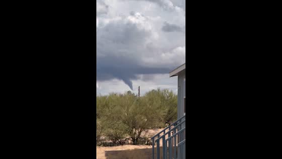 Rare funnel cloud forms over Sierrita Mountains near Tucson, Arizona