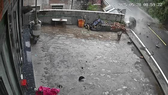 Car hit by landslide and pushed off cliff in Zhejiang, China