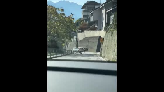 Electric scooter rider wobbles and falls on Sondrio road, Italy