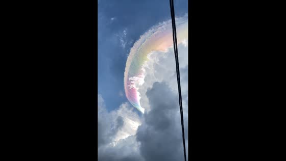 Iridescent clouds create rare rainbow glow over Bogor sky, Indonesia