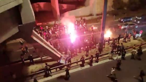 Protesters light fires in Israeli streets during demonstration