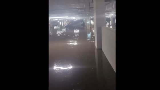 Flooding in Moscow's Dmitrovsky park complex underground parking caused by heavy rainfall