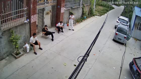 Thoughtful toddler brings a stool to someone without a seat in Henan, China