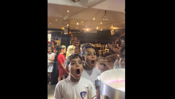 Children cheer for Messi-themed candy in San Isidro, Argentina