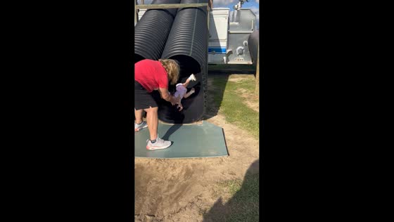 Little girl’s first slide ends in the sand in Louisiana, USA