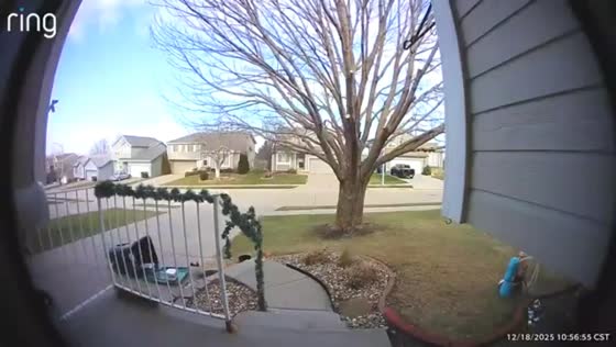 Strong gusts overturn trash bin in Omaha, Nebraska, USA