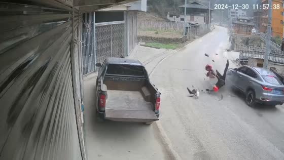 Motorcycle and car collision captured on security video in Guizhou, China