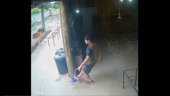 Unexpected mishap: man trips over dog bowl and takes a tumble