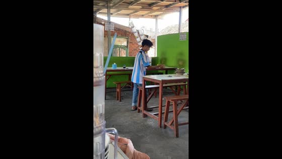 Glass tower balancing act in Cimahi, Indonesia