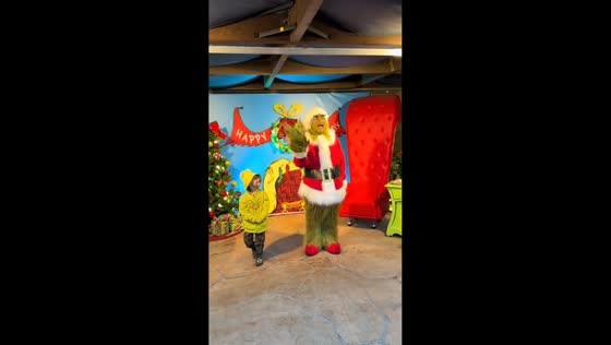 Grinch entertains tourists at Universal Studios Hollywood, California, USA