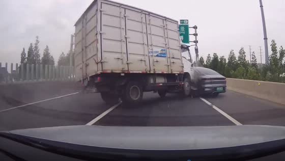 Truck crashes into car on Shanghai highway, miraculous escape for occupants
