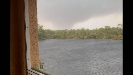 Large tornado captured on video near Jensen Beach