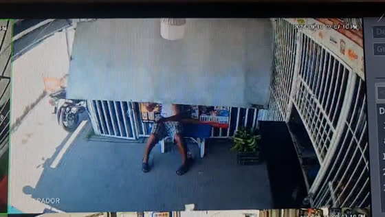 Window cover falls on man while sitting outside store