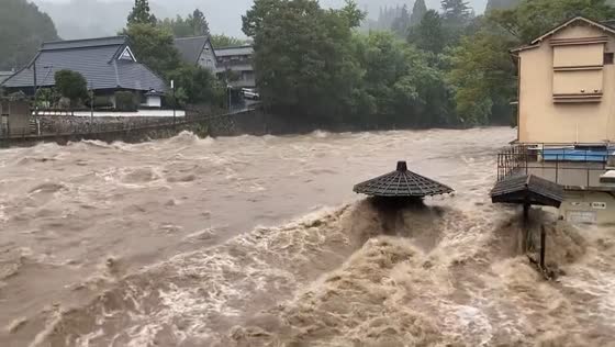 Raging torrents: Yoshii River swells amidst heavy rain