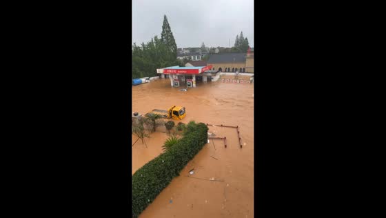 Severe flooding submerges gas station and vehicles as Typhoon Dolphin hits Zhejiang, China