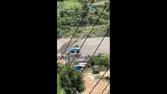Flash flood surges through Trishuli River basin in Galchhi, Nepal