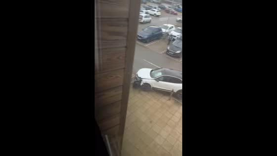 Opel Mokka collides with bollards and posts in Scunthorpe parking lot, England, UK