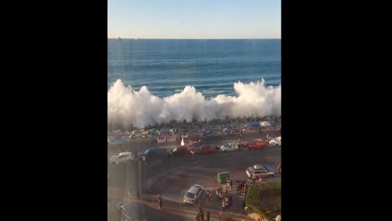 Waves push water past oceanfront in Viña del Mar, Chile