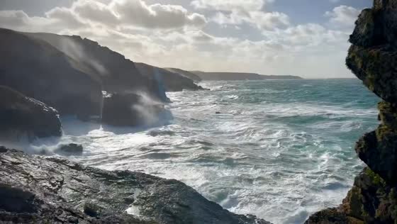 Storm Austen unleashes towering waves along the rugged coastline of Cornwall, UK