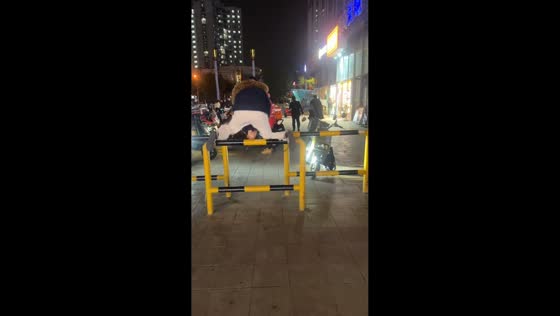 Person fell after jumping over a fence in Jiangsu, China
