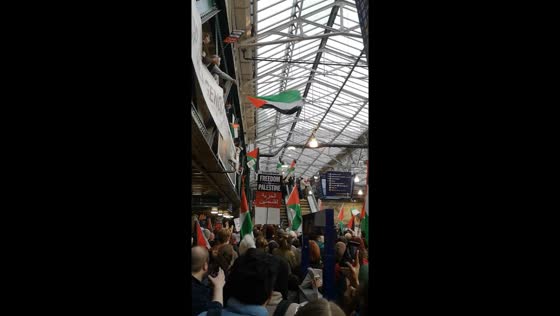 Pro-Palestine protesters rally at Edinburgh Waverley train station