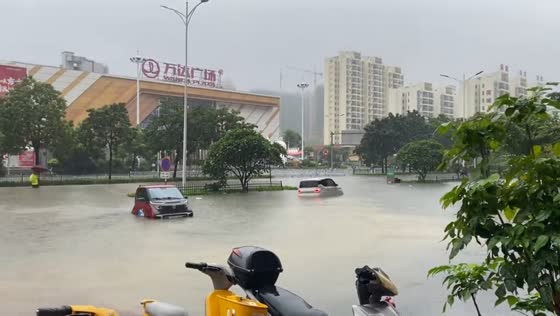 Severe urban flooding submerges streets near Wanda Plaza in Guangxi, China