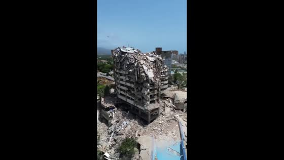 Drone captures collapsed apartment building after twin earthquakes in La Guaira, Venezuela