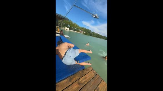 Teen slips on floating mat draws laughs during friends' day out in L'Isle-Jourdain, France