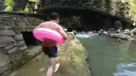 Woman slips and bounces into water during swimming mishap in Hubei, China
