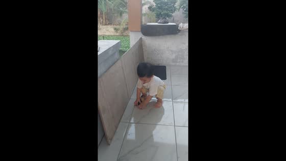 Child's attempt to catch duckling ends in surprise sit-down