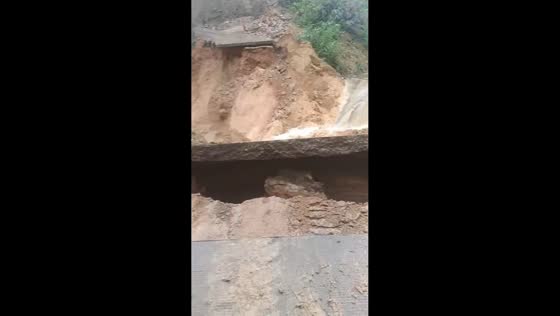 Heavy rainfall triggers flooding and road damage in Fujian, China