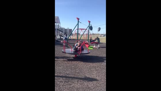 Child screams on fast merry-go-round in Nampa, Idaho, USA