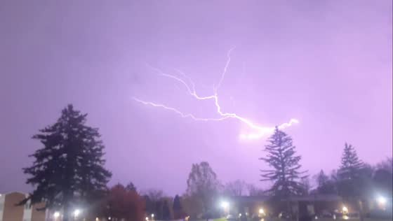Lightning and hailstorm illuminate the night sky in Rochester, New York