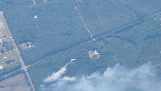 Aerial view shows wildfire firefighting efforts near St. Augustine, Florida, USA