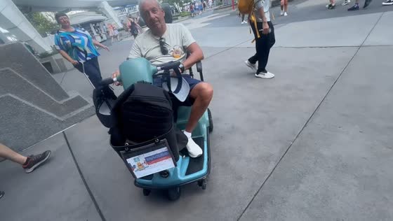 Grandfather’s scooter mishap surprises family in Disney Orlando, Florida, USA