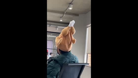 Bogota's quirkiest costume: boss turns heads with chicken hat dance at office contest