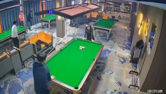 Pool mishap: cue ball collision causes painful accident in Guangdong Province