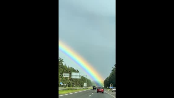 Enchanting double rainbow delights travelers in Rakov, Belarus