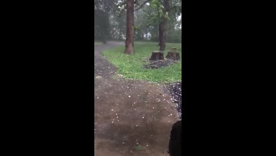 Hailstorm blankets ground during heavy rain in Fayetteville, North Carolina, USA