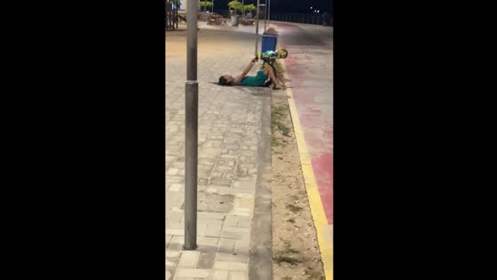 Person riding children's toy tricycle falls in Salinópolis, Brazil