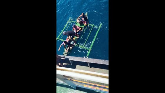 Cargo crew to the rescue: fishermen saved from sinking boat in Philippines 