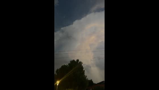 Lightning-filled supercell storm rolls over in Trezzano sul Naviglio, Milan, Italy