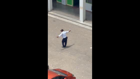 School guard joins dance during student event in Cebu, Philippines