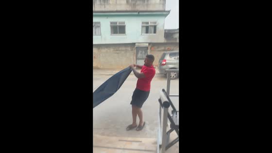 Strong wind sends water tank covers flying in Belford Roxo, Brazil