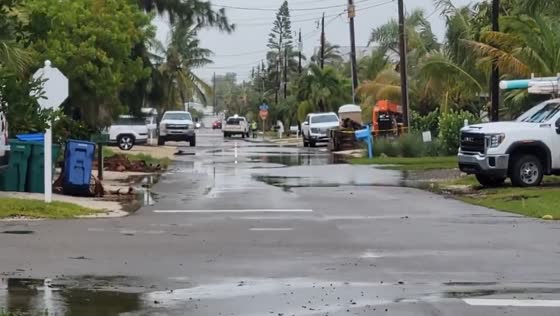Cleanup begins on Bradenton Beach, Florida amid gusty winds after storm Debby