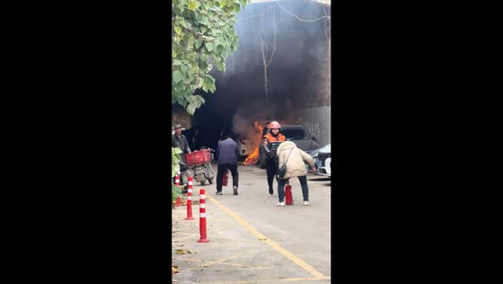 Tunnel electric car fire sparks quick response in Hubei, China